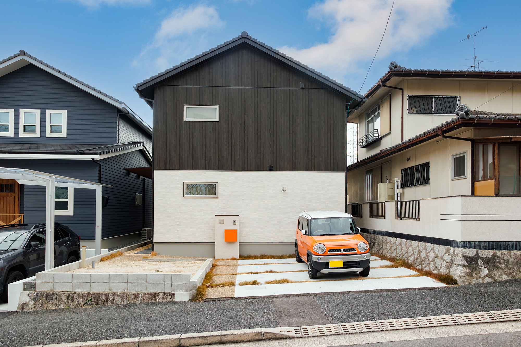 ピットリビングと吹き抜けの大空間が家族の時間を豊かにする住まい